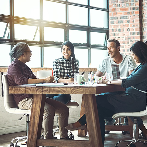 People having a meeting at a table