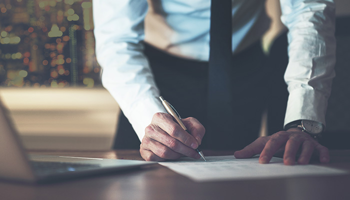 Man writing on paper