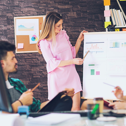 Woman doing a presentation with graphs
