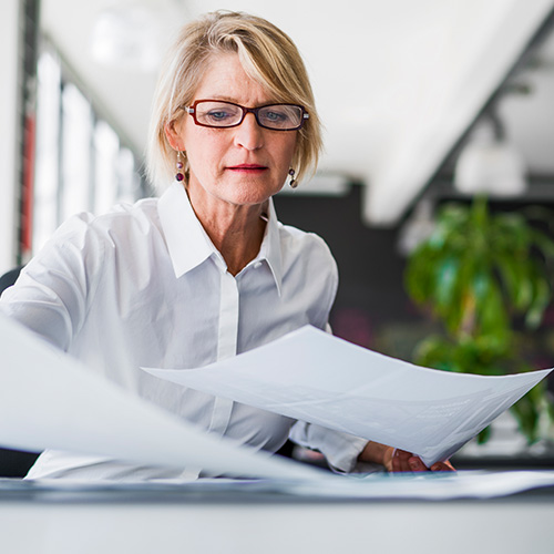 Woman looking at papers