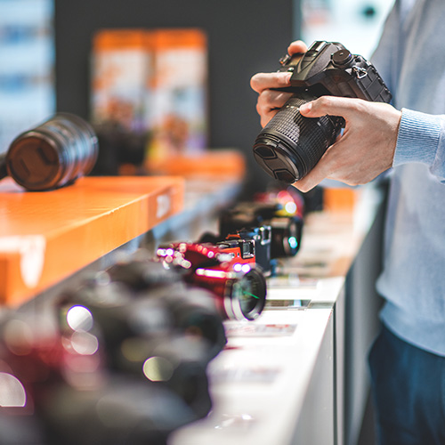 Photographer looking at cameras