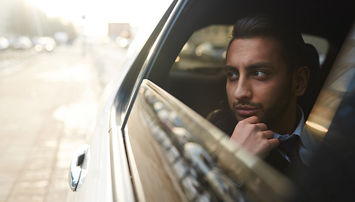 Man looking out of a car window