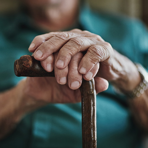 Woman holding a cane
